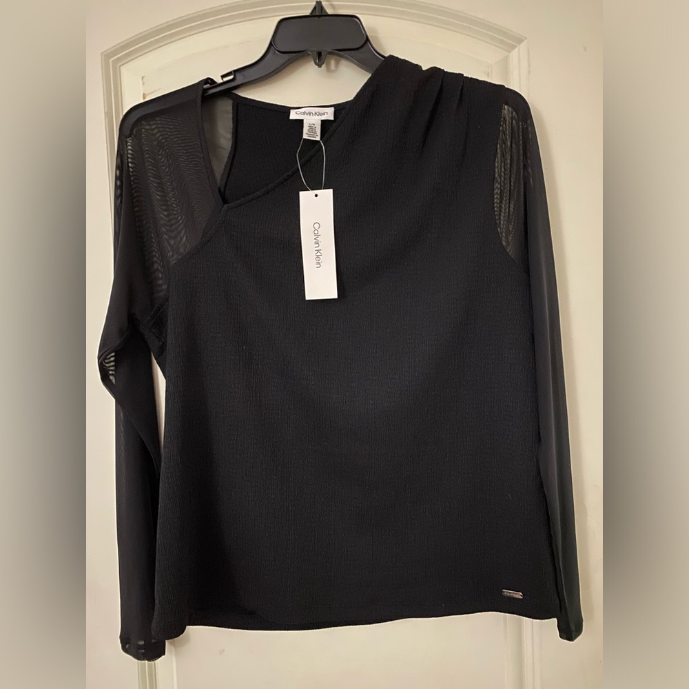 Cavin Klein Women’s Size L. See Through Sleeves On One Shoulder.